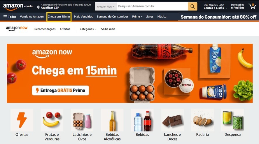 Screenshot da página inicial da Amazon Brasil destacando o serviço "Amazon Now" com entrega em 15 minutos e produtos de mercado.
